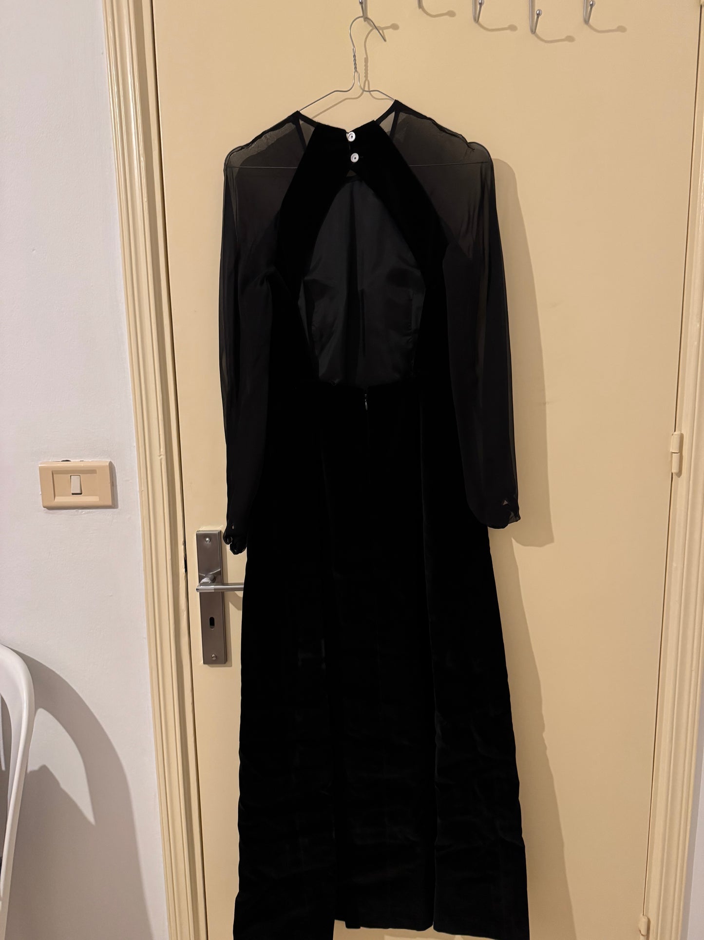 Elegant Black Velvet Gown with Sheer Sleeves and Open Back